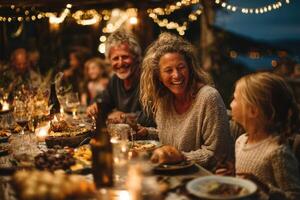 A family enjoying dinner at the dinner table photo