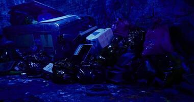 CGI Garbage collection at night with neon lighting in a narrow alley video