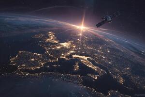 The earth at night with satellites in the sky photo