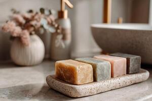 A soap bar on a counter next to a sink photo