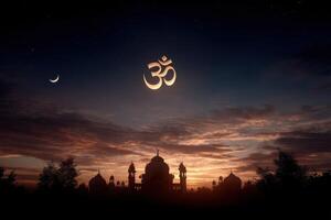 The moon and the om symbol in the sky at sunset photo