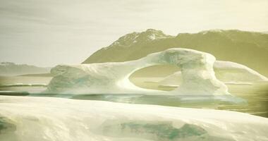 CGI Ice formation with arch in a tranquil frozen landscape during dusk video
