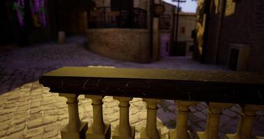 CGI Stone railing overlooking a tranquil cobblestone street at dusk video
