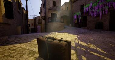 CGI Old suitcase resting on cobblestone street in quaint village during sunny day video
