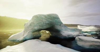 CGI Ice formations create natural arches in a serene Arctic landscape at sunrise video