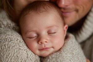 A man and woman are holding a baby photo