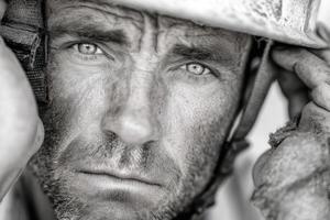 A man in a hard hat and helmet photo
