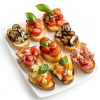 A vibrant platter of assorted bruschetta, featuring grilled bread topped with various toppings, such as fresh tomatoes and basil, mushrooms and truffle oil, and prosciutto and melon, perfect for an appetizer, isolated on clean white background. photo