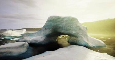CGI Stunning ice arch formation in a serene Arctic landscape during sunset video
