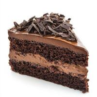 A decadent slice of chocolate cake with layers of moist, rich cocoa sponge and creamy chocolate ganache. The dessert is topped with dark chocolate shavings for an indulgent finish. Isolated on clean white background photo