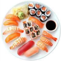 A vibrant sushi platter featuring an assortment of nigiri and maki rolls. Fresh salmon, tuna, and shrimp rest atop small mounds of perfectly seasoned rice, accompanied by wasabi, soy sauce, and pickled ginger. A feast for sushi lovers. Isolated on clean w photo