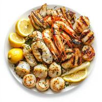 A vibrant platter of mixed grilled seafood, featuring shrimp, calamari, scallops, and fish, marinated in olive oil, lemon juice, and herbs, grilled until tender and slightly charred, served with a side of lemon wedges and a light vinaigrette, isolated on photo