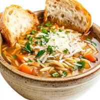 A close-up of a warm and comforting orzo soup, a hearty Italian soup with orzo pasta, vegetables, and chicken broth, simmered until thick and flavorful, garnished with grated parmesan cheese and fresh parsley, served in a rustic bowl with crusty bread, is photo