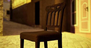 CGI Wooden chair in an illuminated alleyway during sunset video
