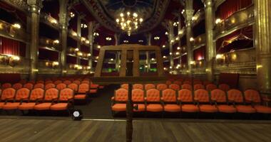 CGI Empty theater with wooden music stand in front of seating area video