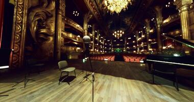 CGI Elegant theater interior with microphone and piano setup for performance video