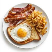 A plate with a breakfast of eggs, bacon and toast photo