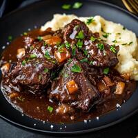 Slow cooker beef stew with mashed potatoes photo