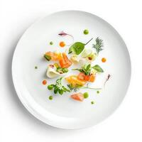 A white plate with a salad on it photo