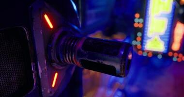 CGI Futuristic device with glowing lights in a vibrant urban setting video