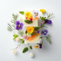 A piece of soap with flowers and herbs on it photo