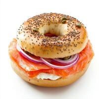 A bagel with salmon and onions on it photo