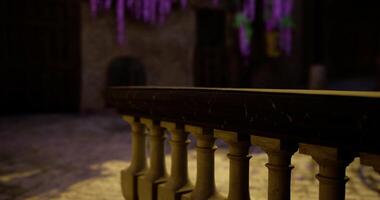 CGI Intricate balcony railing in a historic setting with purple flowers above video
