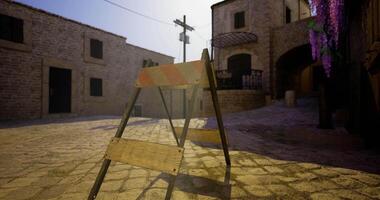 CGI Construction barriers mark area in a historic stone village at sunset video