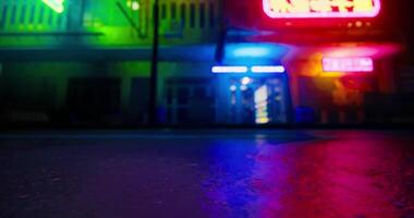 CGI City street at night with colorful neon lights reflecting on wet pavement video
