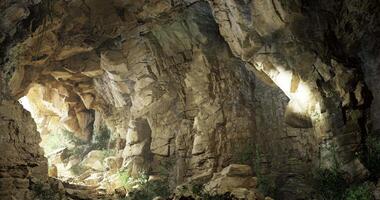 CGI Beautiful cave with light illuminating stone formations in nature video