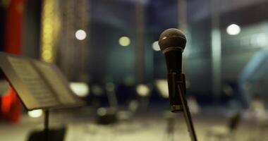 CGI Microphone on stage with empty seats ready for a performance in a concert hall video