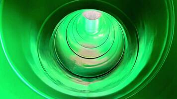 A green tunnel with a circular shape photo
