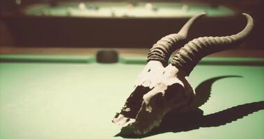 CGI Unique skull accent on billiard table in a vibrant game environment video