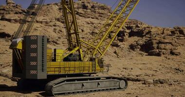 CGI Heavy machinery operates in a rocky desert landscape during daylight hours video