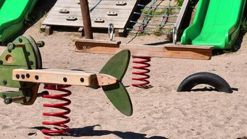 The playground is filled with colorful, engaging springbased toys for childrens endless fun and enjoyment photo