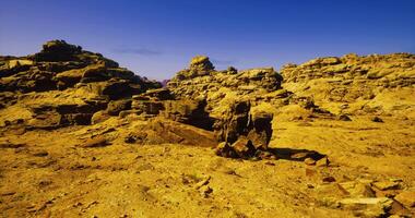 CGI Majestic desert landscape with unique rock formations under blue sky video