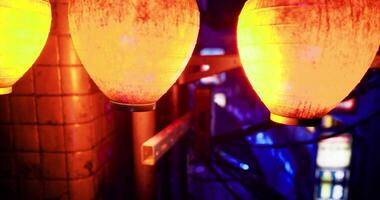 CGI Colorful lanterns illuminate a vibrant urban night in an Asian setting video