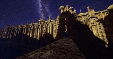 CGI Majestic ancient structure illuminated by a starlit sky at night video