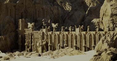 CGI Impressive sand sculpture resembling ancient architecture in a desert location video