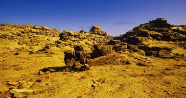 CGI Desert landscape featuring unique rock formations under a clear blue sky video