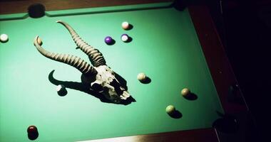 CGI Unique table setup with horned skull and colorful billiard balls video