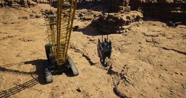 CGI Heavy machinery operates in a rugged terrain at a construction site video