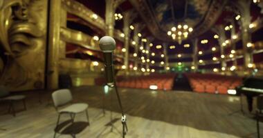 CGI Empty theater stage prepares for a captivating performance with microphone video