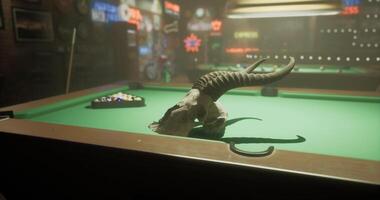 CGI Pool table with bull skull and colorful bar decorations in a dimly lit room video
