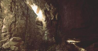 CGI Exploring the mysterious rock formations in a dimly lit cave environment video