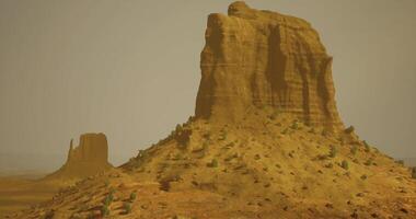 CGI Majestic rock formations under a hazy sky in a desert landscape video