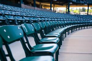 Aesthetic Rows of Empty Green Stadium Seats in Perfect Order photo