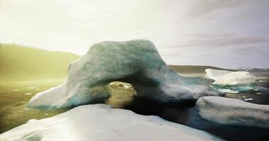 CGI Majestic ice arch formation amidst tranquil waters in a remote Arctic landscape video