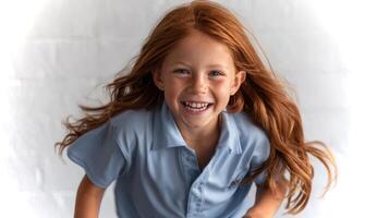 A young girl with flowing red hair smiles brightly while playing a game of dodging tag in a fun, vibrant environment. photo