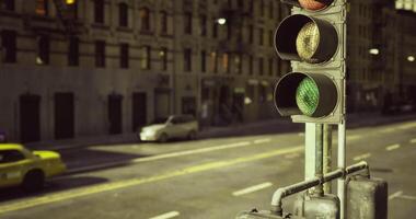 CGI Traffic light in a busy city setting with vehicles on the road video